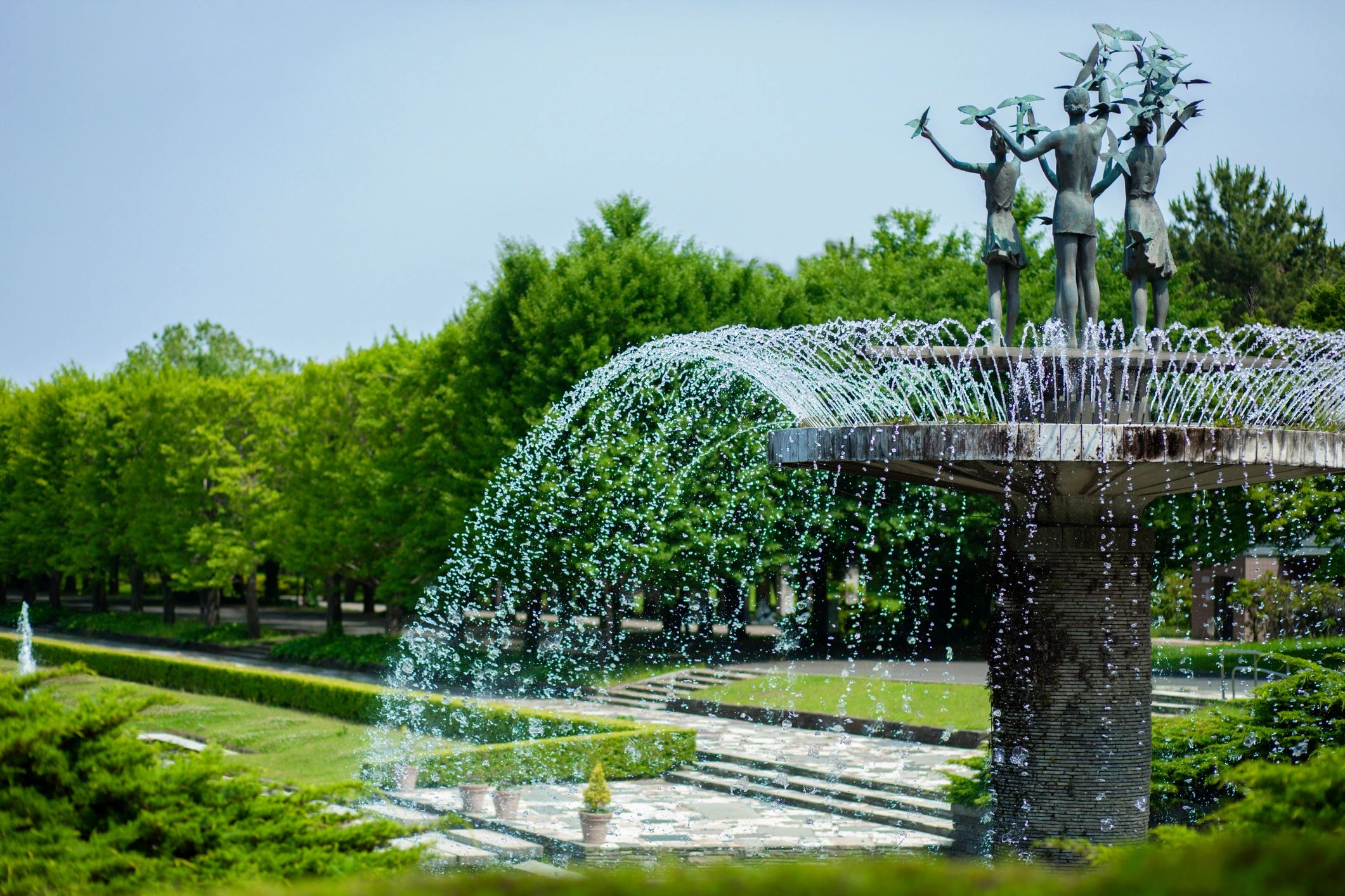 Garden fountain in a sunny park