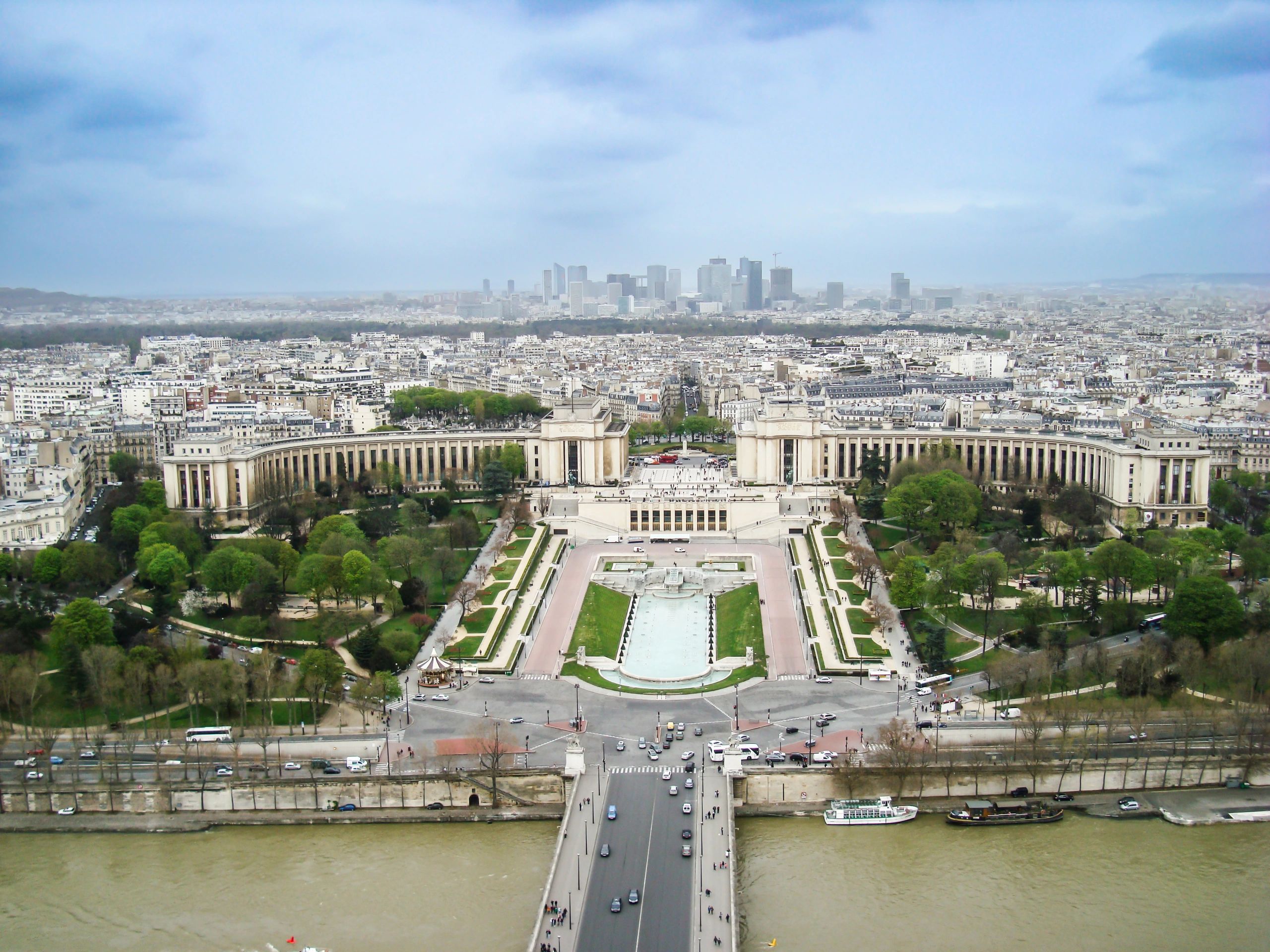 Large public fountain and river view in a city